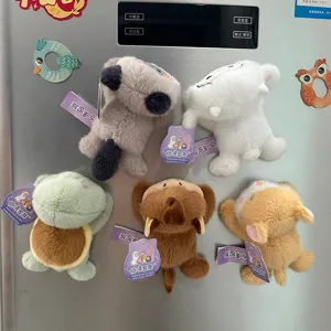 Collection of cute cartoon plush animal refrigerator magnets including turtle and monkey