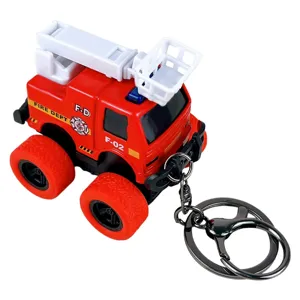 Red miniature fire truck keychain toy with orange textured tires
