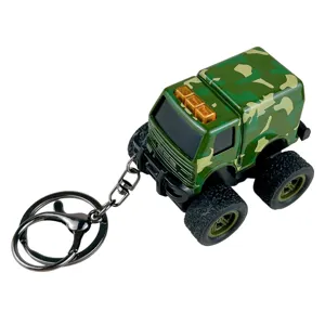 Military camouflage off-road truck keychain toy with large wheels on a white background