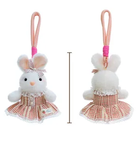 Detailed front and back view of a cute plush bunny doll in a plaid dress with a pink strap