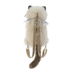 Back view of plush Ragdoll cat backpack with adjustable straps and fluffy tail.