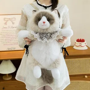 Detailed view of plush ragdoll cat backpack featuring a delicate lace collar