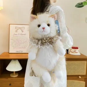 Realistic white plush cat backpack with lace collar detail on a back of a girl