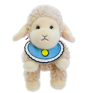 Cute fluffy curly sheep plush toy featuring a blue bib, perfect for kids New Year gift