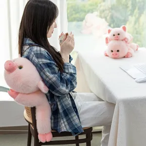 Simpatico cuscino di peluche a forma di maiale rosa come supporto per la schiena.