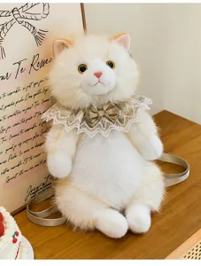 Detail shot of the plush cat backpack featuring a lace collar and checkered bow