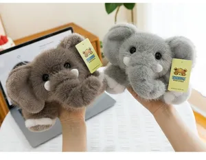 Macro view of soft grey and brown elephant plush toys with detailed furry texture