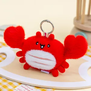 Adorable red plush crab keychain bag charm featuring heart-shaped claws and soft texture