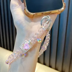 Elegant pink crystal beaded phone strap with heart perfume bottle pendant for bags