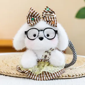 Adorable plush white puppy pendant wearing black glasses and a brown checkered bow accessory