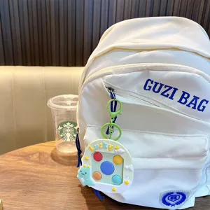 Weißer Canvas Rucksack mit süßem Tier Push Pop Spielzeug Schlüsselanhänger, Schultasche
