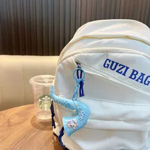 Llavero de juguete de saxofón azul para mochilas, lindo adorno colgante para bolsos