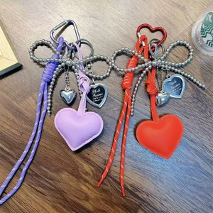 Stylish PU leather heart keychains with beaded bows for bags or phones