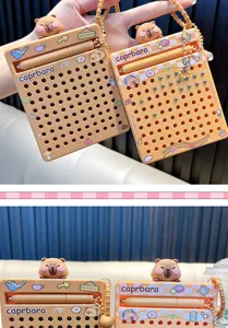 Macro view of cute capybara magnetic bead drawing board keychains for bag charms