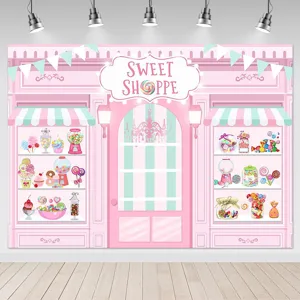 Sfondo fotografico rosa del negozio di dolci con cupcake per festa di compleanno bambina