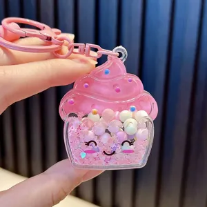 Cute pink cupcake liquid shaker keychain with star sequins and colorful beads pendant
