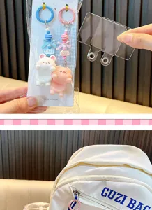 Detailed view of cute rabbit and pig keychains used as backpack pendants