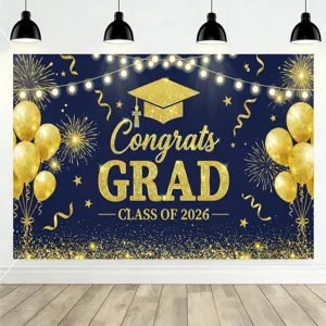 Navy blue and gold 2026 graduation party backdrop with balloons and fireworks decor