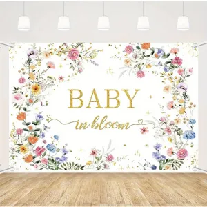 Floral wildflower baby shower backdrop banner with 'BABY in bloom' gold glitter text