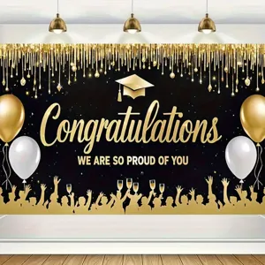 Black and gold graduation party backdrop with balloons and Congratulations message.