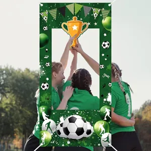 Green soccer themed photo booth banner backdrop with trophy and ball for party decor