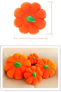Collection of orange pumpkin plush pillows in various sizes displayed on a neutral sofa