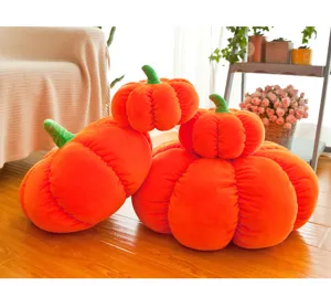 Soft orange pumpkin plush pillows in various sizes for cozy autumn home decor and gifts