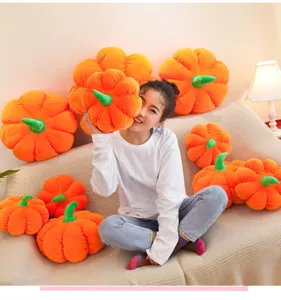 Soft orange pumpkin plush pillows in various sizes for cozy Halloween home decoration