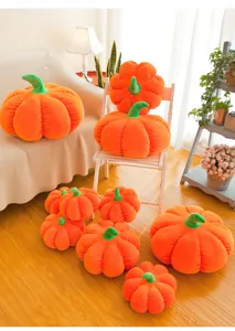 Set of soft orange pumpkin plush pillows in various sizes for cozy autumn home decor