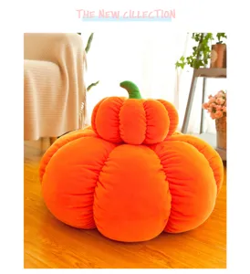 Close-up of soft orange pumpkin plush cushions for Halloween home decoration