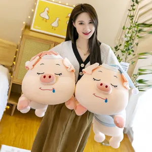 Adorable sleeping pig plush toy large soft body pillow held by an Asian girl in a bedroom
