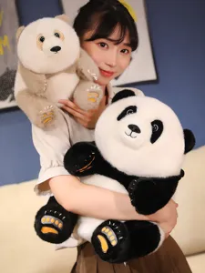 Soft and realistic giant panda plush toy held by a girl in a cozy indoor setting