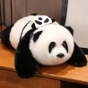 Detailed view of a fluffy panda plush toy wearing a cute mini panda backpack