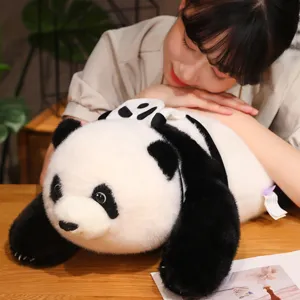 Detail view showing the soft texture of a panda plush backpack toy being hugged by a model