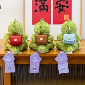 Peluches de dinosaurio verde con mini mochilas de colores para regalo infantil