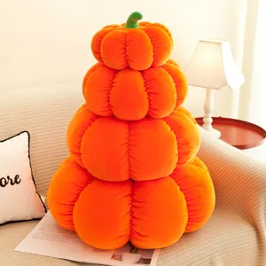 Set of soft orange pumpkin plush pillows for cozy Halloween home decoration and gift