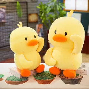 Pair of cute soft yellow duck plush toys for kids room decor and stuffed animal gift