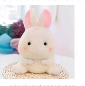 Cute white plush rabbit toy stuffed cute animal doll soft fluffy gift for kids and home decor.