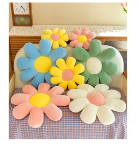 Collection of colorful daisy flower plush cushions arranged on a cozy home sofa chair
