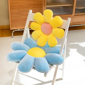 Daisy flower shaped seat cushions and pillows set on a white chair