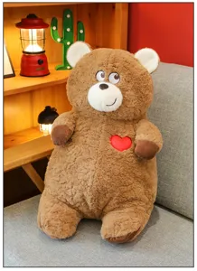 Brown plush teddy bear toy with a cute red heart, perfect Valentine gift for girls.