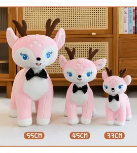 Set di tre peluche a forma di cervo rosa in varie dimensioni con fiocchi