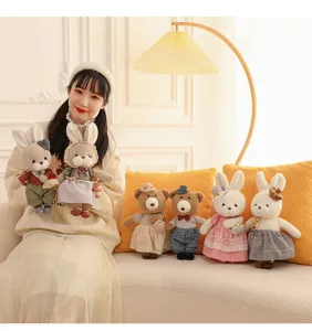 Couple of cute plush teddy bear and rabbit dolls in various outfits