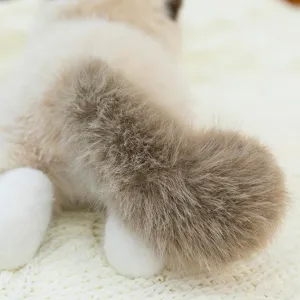 Realistic ragdoll cat plush toy with fluffy tail and soft fur detail