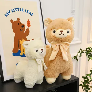Adorable cream and light brown alpaca plush doll set with decorative bows for cozy home decor