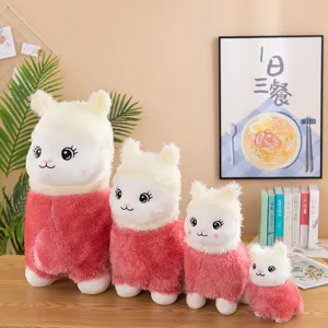 Set of four cute cartoon alpaca plush toys in soft pink and cream white colors for girls