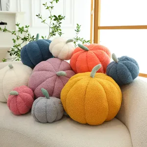Soft plush pumpkin-shaped throw pillows in various colors for cozy sofa decoration