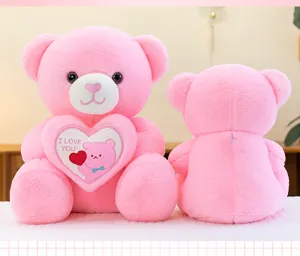 Detailed front and back views of a pink plush teddy bear holding an embroidered heart.