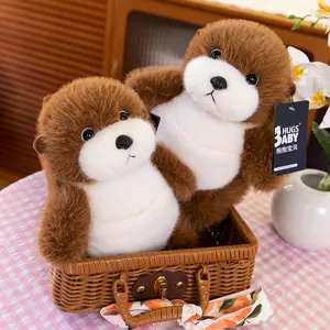 Two adorable realistic brown and white sea otter plush toys in a decorative woven basket