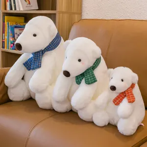 Three white plush polar bear toys with colorful scarves in small, medium, and large sizes